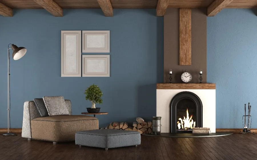 Living room interior painting with slate blue walls, painted fireplace surround and wood beams, Delray Beach, FL